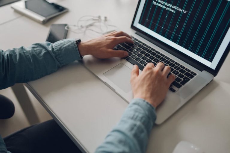 The “Ultimate Productivity” Formula: 5 Practical Systems to Improve Productivity 4 Working on a laptop Luxafor