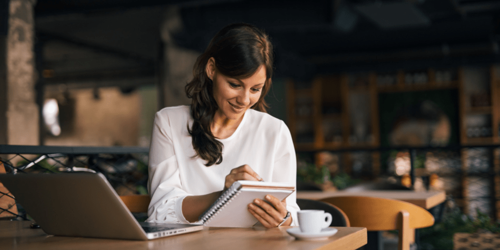 10 Ways to Improve Your Business Productivity 4 Woman-writing-tasks-luxafor